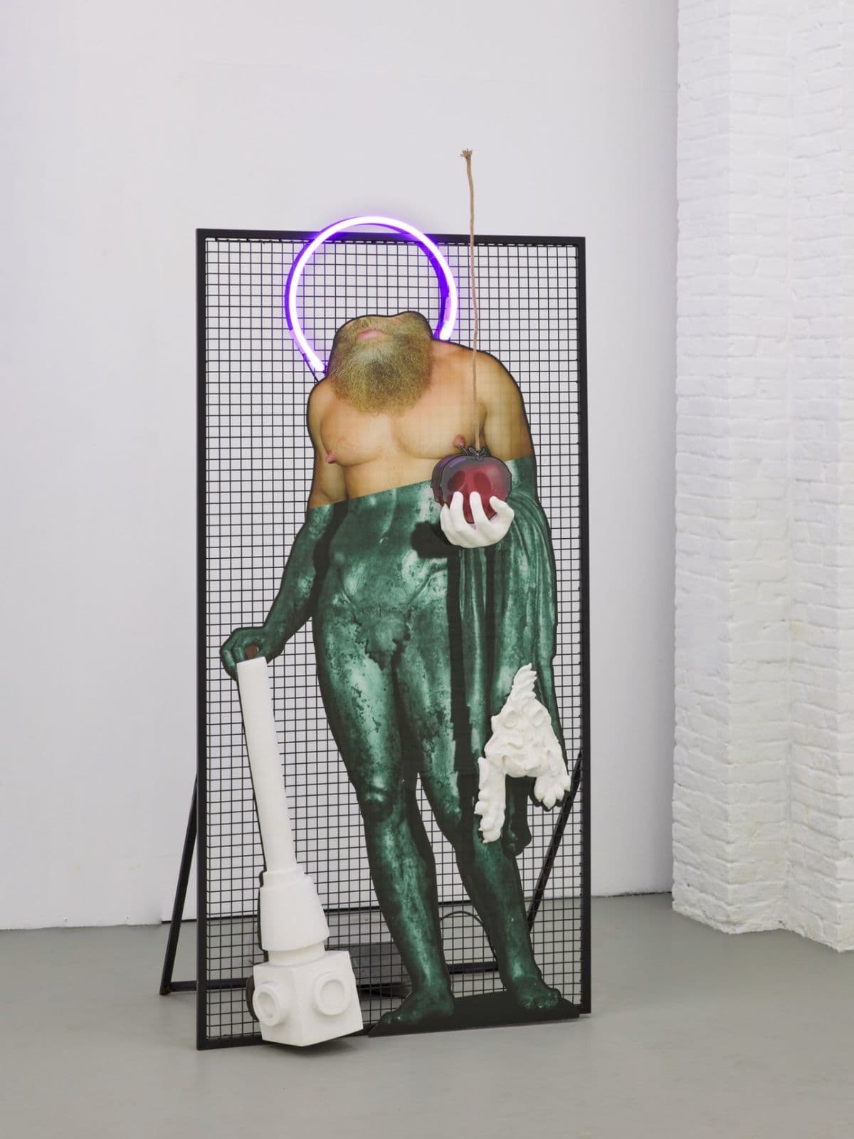 Byzantine Conundrum, mixed-media sculpture by Grigorios Ilaridis depicting a headless Heracles with a neon halo, lion skin and suspended poisoned apple.